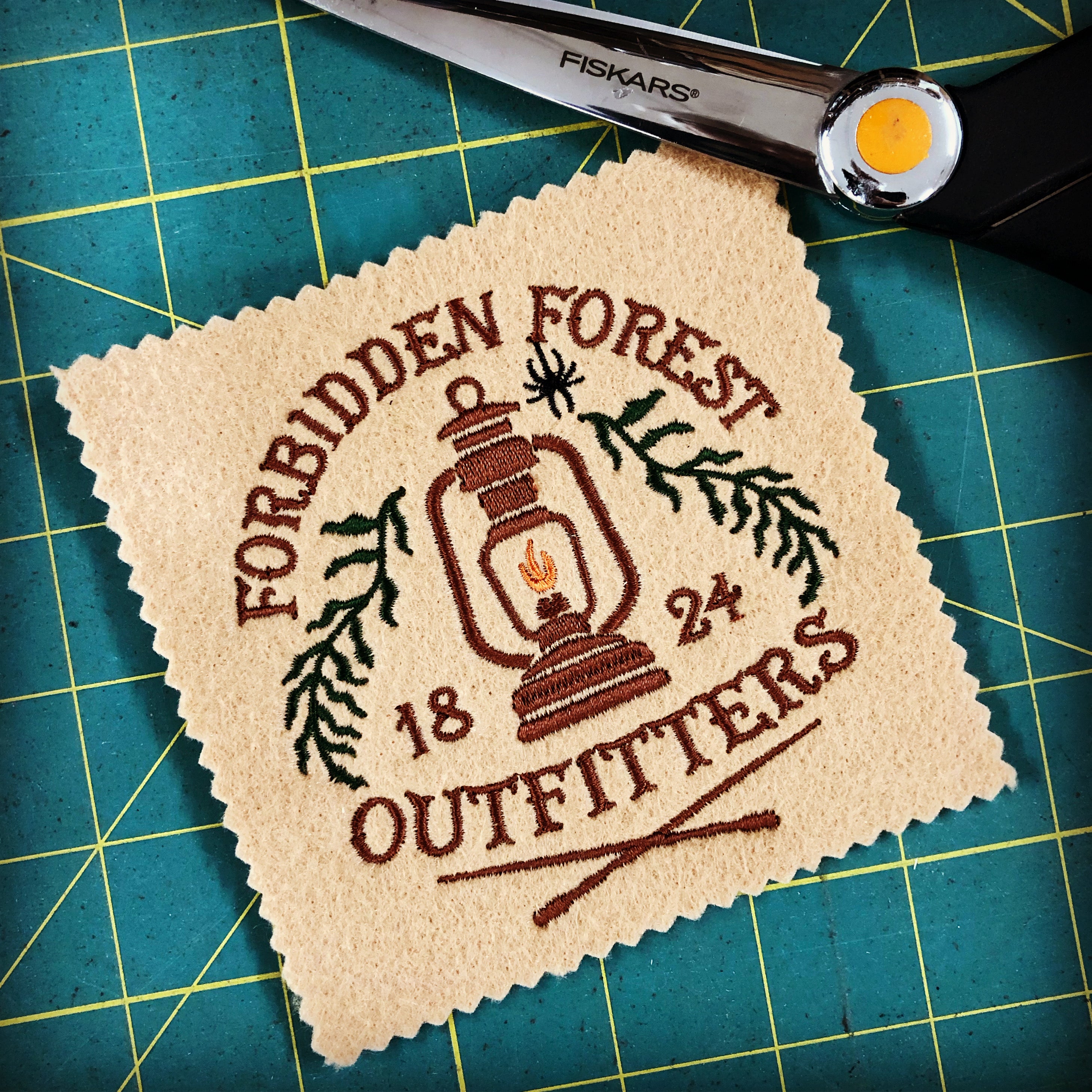 Embroidery: Wizarding Outfitters Vintage Sign - Six Sizes 4-10 Inches Tall - Five Colors